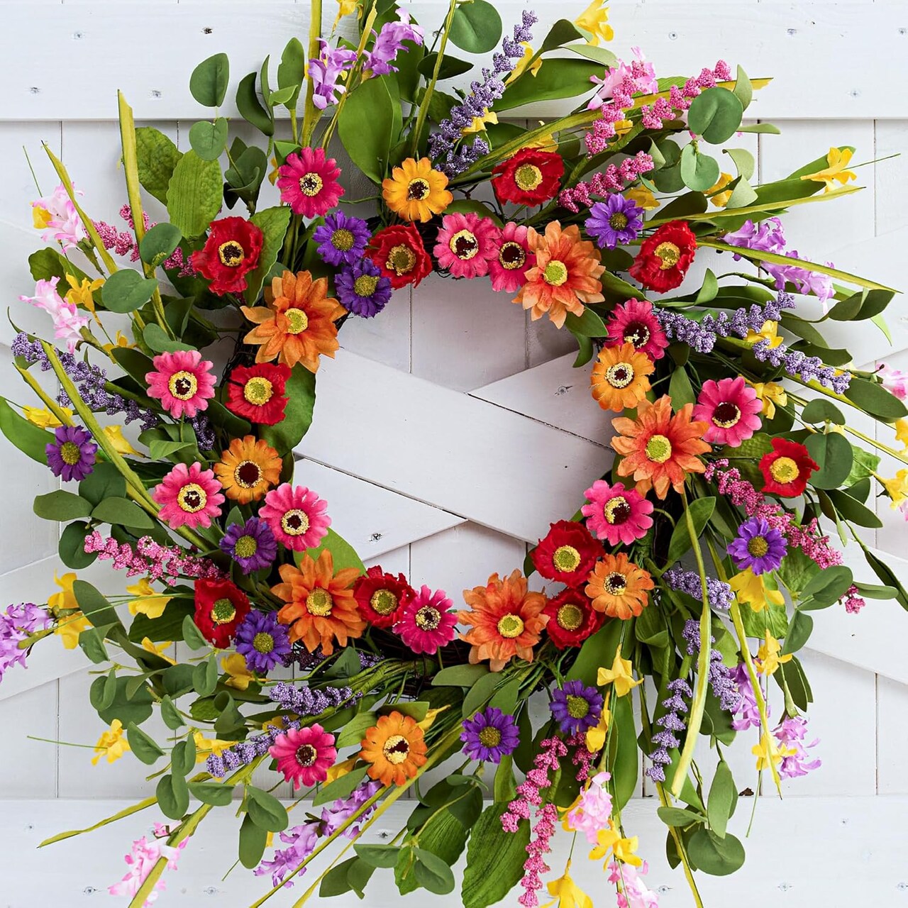 22-Inch Artificial Spring Wreath featuring green eucalyptus leaves, pink daisies, and lavender—perfect for front doors, farmhouse walls, weddings, porches, and Easter décor.